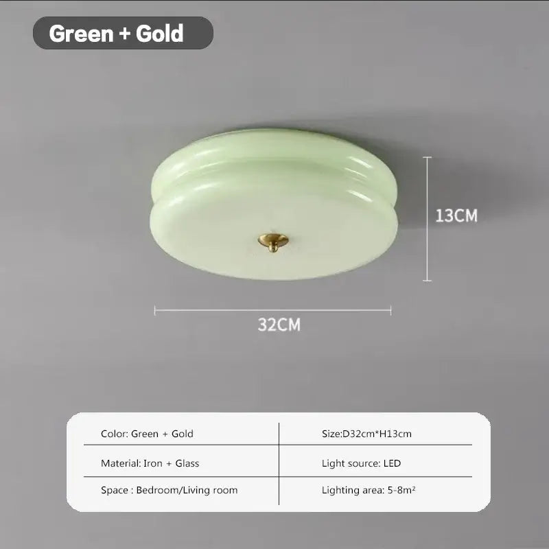 A sleek warm chrome double layer glass led ceiling light with pale green glass shade and gold iron fixture for bedroom