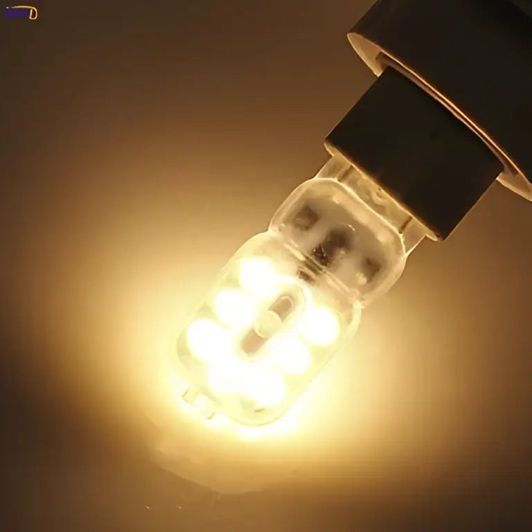 Warm white decorbites g9 led bulb with clear glass casing and black base for living room lighting