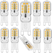 Clear glass DecorBites G9 LED bulb with warm white glow and metallic contacts for living room light decor
