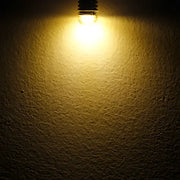 A warm white frosted decorbites g4 led bulb with frosted glass and metallic base for home lighting and bedrooms