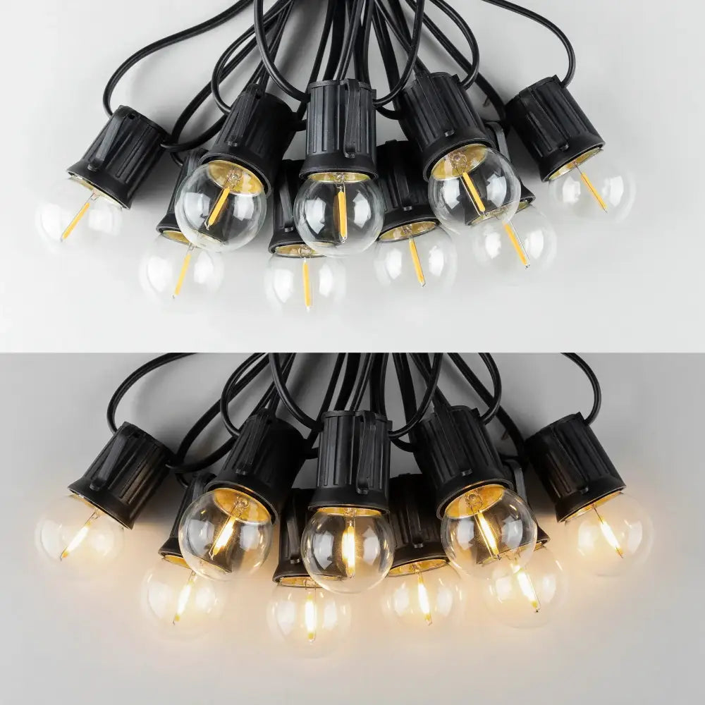 Black plastic bulb holders with clear g40 e27 warm white led globe bulbs featuring e27 1w warm filaments