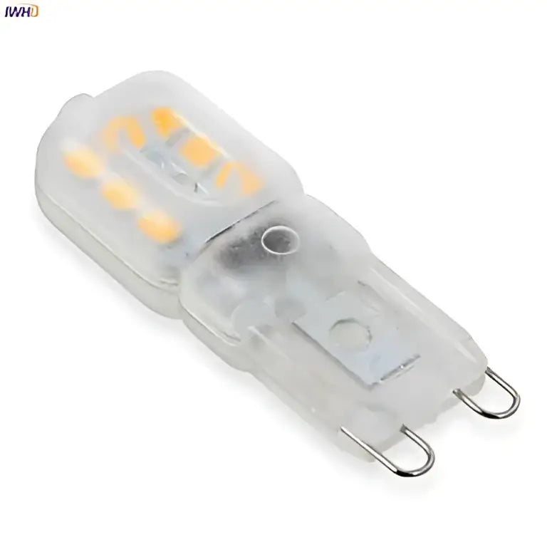 Clear plastic warm white g9 led corn light with visible yellow leds and metallic contacts for chandeliers and bedrooms