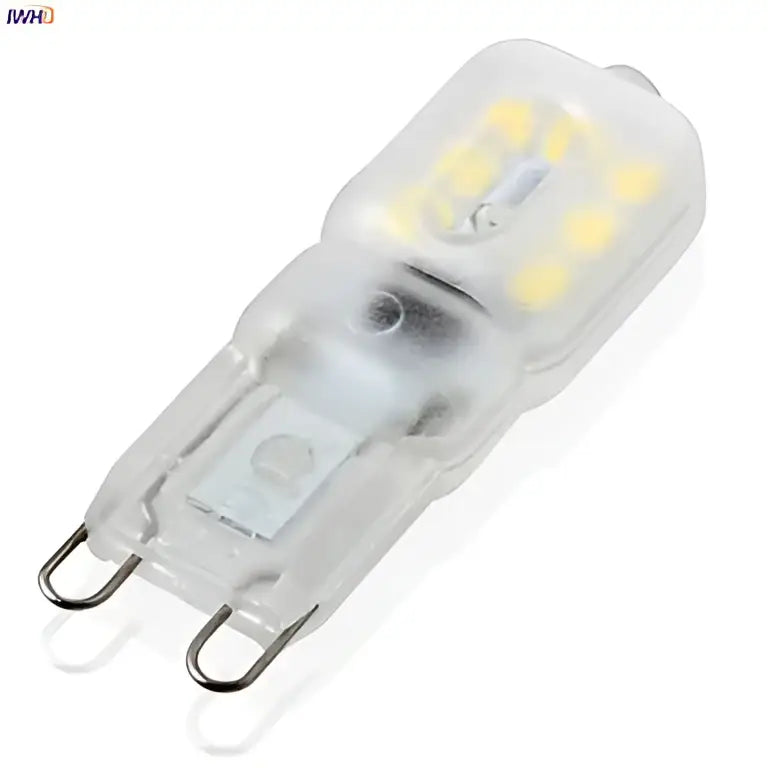 Clear glass g9 led corn light with multiple yellowish leds in a grid for warm white chandelier bedroom use