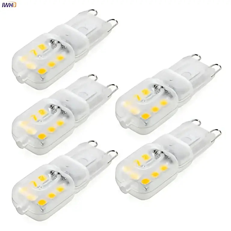 Clear glass warm white g9 led corn lights with yellowish leds and metallic contacts for chandeliers and bedrooms