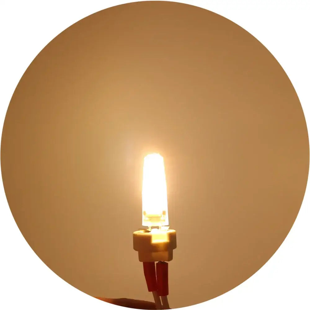 Warm white glass g4 led bulb with compact cylindrical glass body and metallic base for kitchen replacement light decorbites g4 led