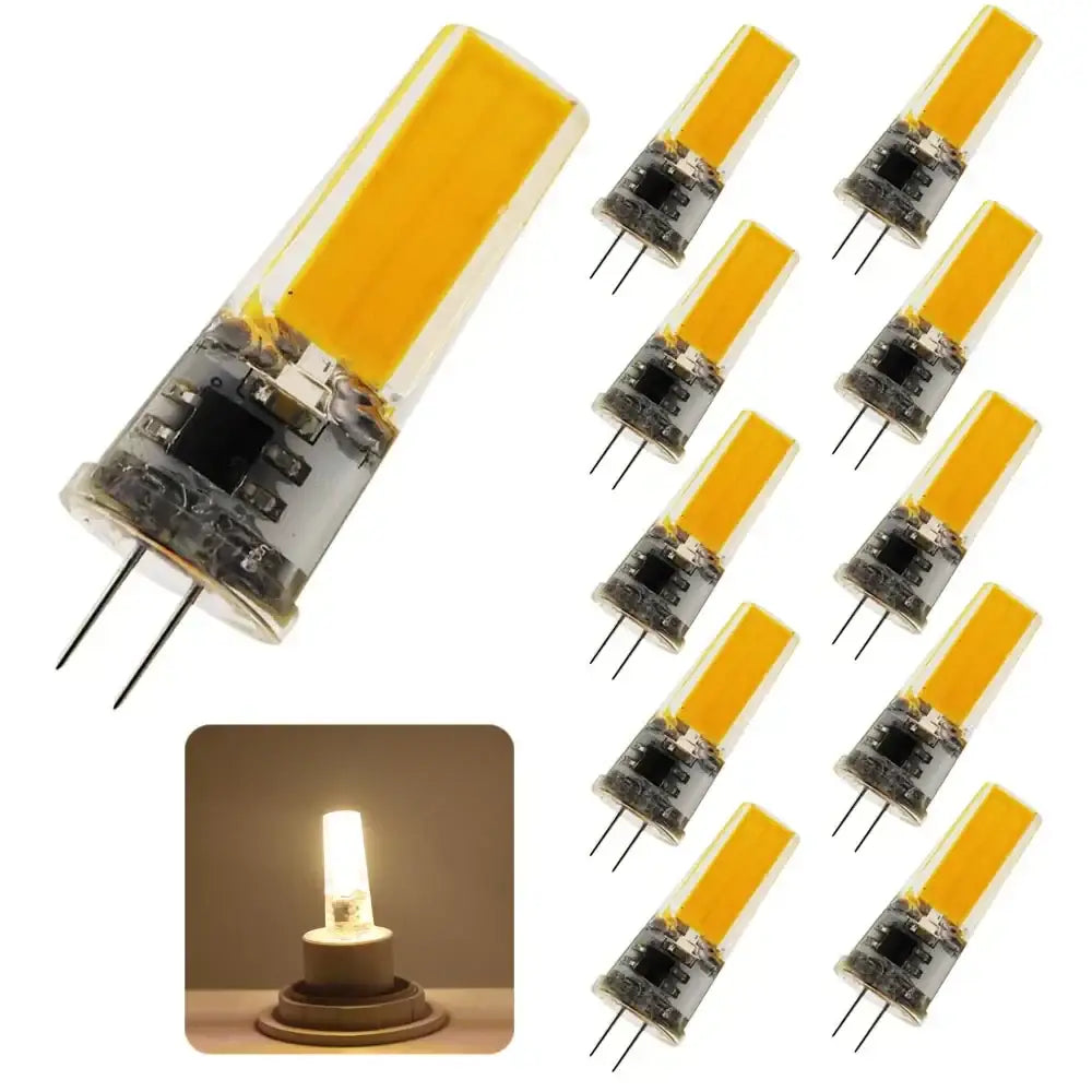 Warm yellow glass g4 cob led bulb with clear casing and two metal pins for indoor living room lighting by decorbites