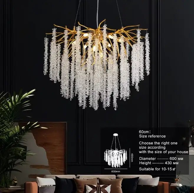 Gold-toned branch-style chandelier with cascading clear crystal droplets featuring warm yellow led glass bulb for bedroom lighting decorbites g9 led