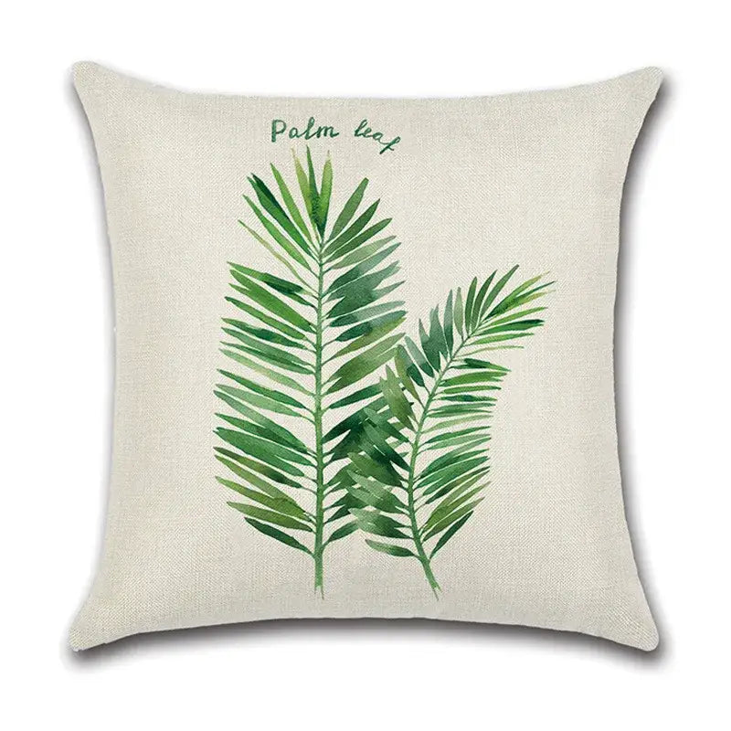 Beige linen pillow case with watercolor green leaves decorative design and palm leaf text for living room use