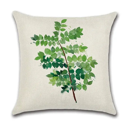 Beige cotton pillow case with watercolor green leaves decorative design featuring varying shades of green for living room
