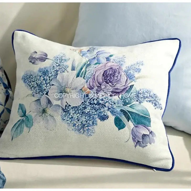 Rectangular cushion cover with delicate purple blue and green iris flowers butterfly design on off-white fabric with navy piping decorbites iris flowers