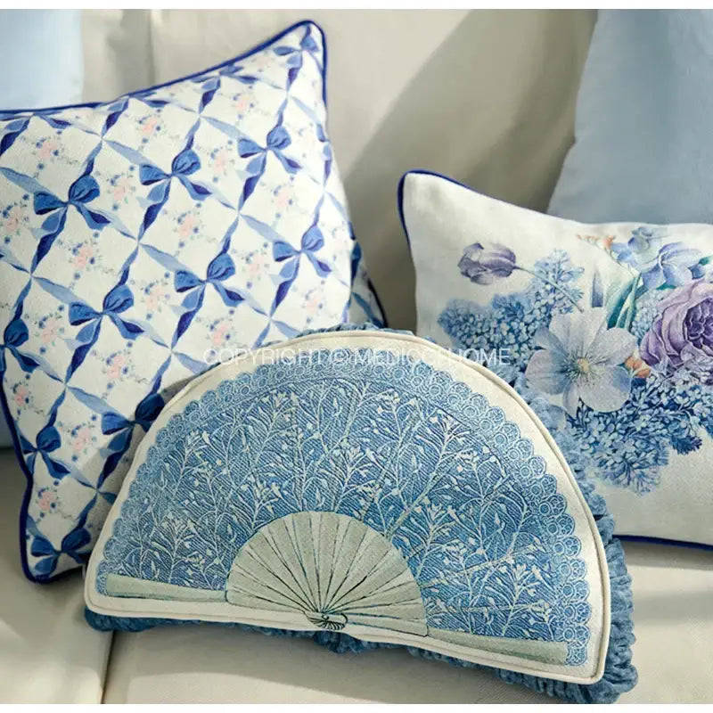 Blue and white embroidered fan-shaped cushion with delicate floral patterns and scalloped edge for decorbites iris flowers decor