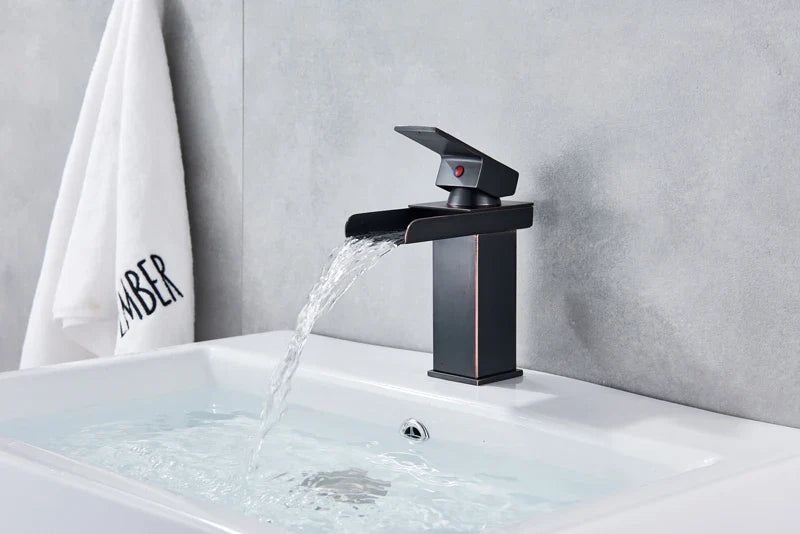 Black matte-finish waterfall bathroom faucet single hole with sleek modern design for contemporary use