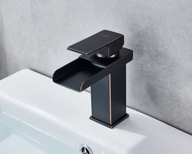 Black matte finished waterfall bathroom faucet single hole with sleek modern design and subtle copper accents
