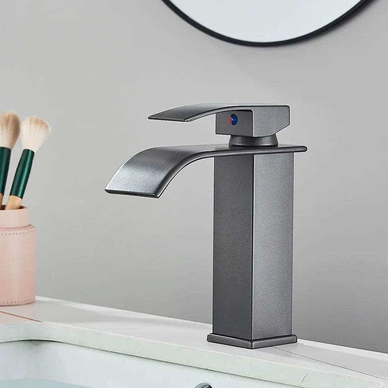 Modern matte black waterfall bathroom faucet single hole with a sleek spout design for contemporary sinks
