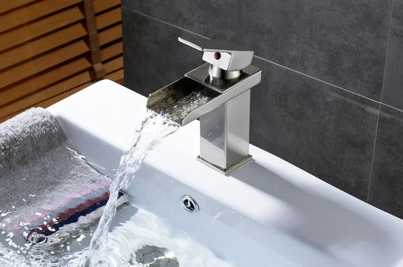 Modern chrome-finished waterfall bathroom faucet single hole with a sleek angular design and durable material