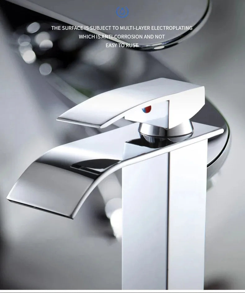 Modern chrome-finished stainless steel waterfall faucet with angular design and red-blue indicator for wash basin use