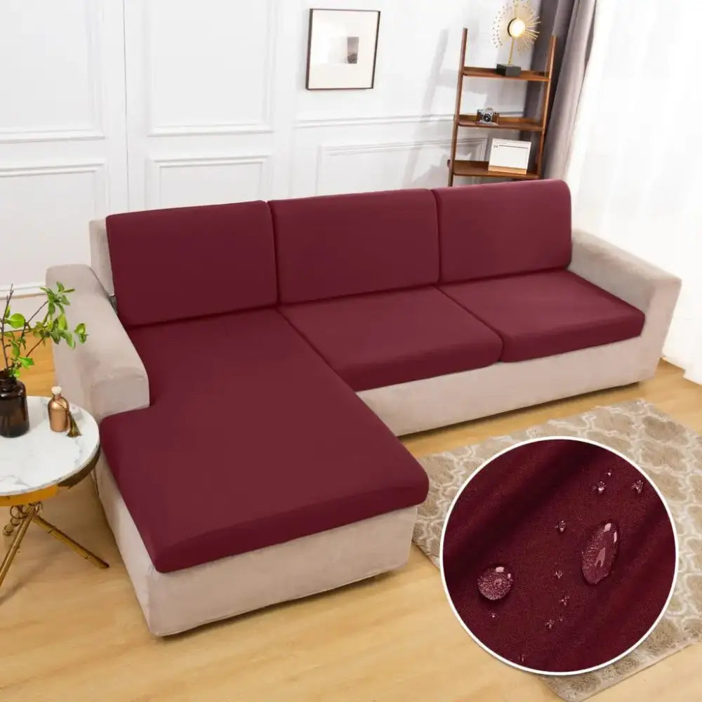 Beige stretchy fabric sofa cover with water-resistant properties designed as a living room protector
