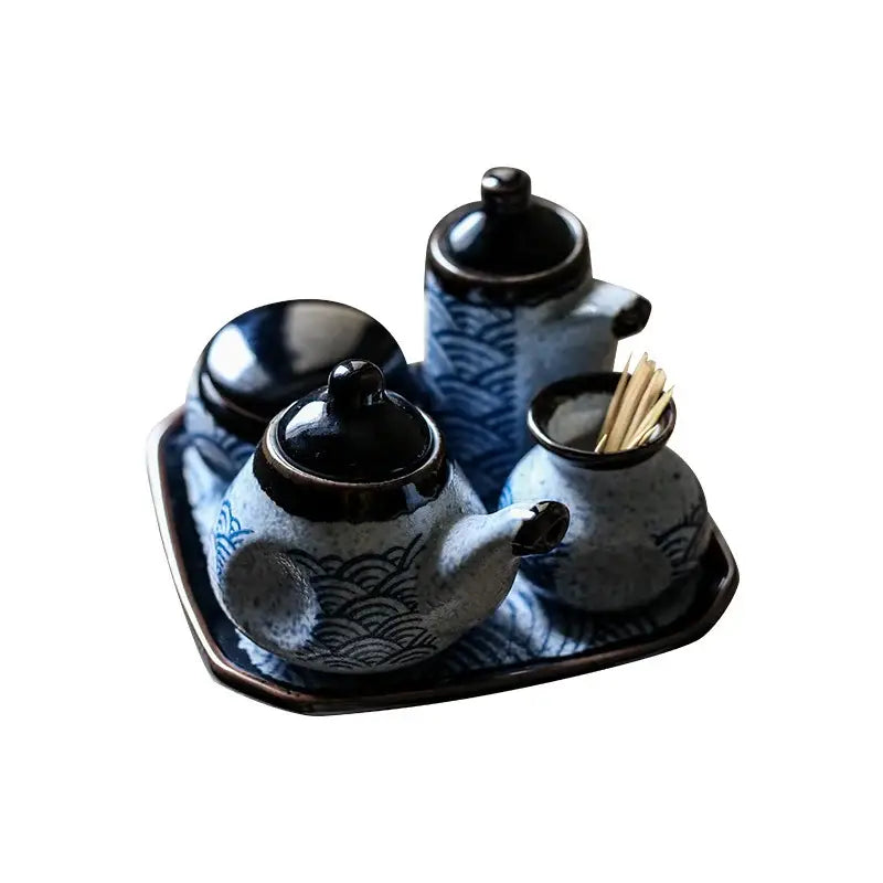 Blue and white ceramic seasoning set with wave patterns and black lids from decorbites blue ceramics kitchen collection