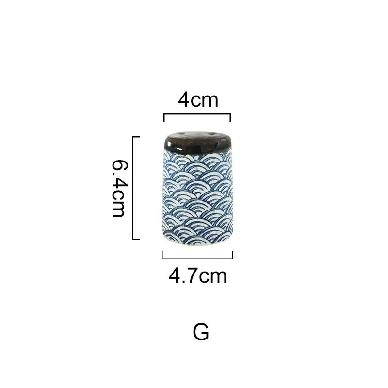 A cylindrical ceramic seasoning set with glossy dark brown lid and traditional blue wave patterns by decorbites blue ceramics