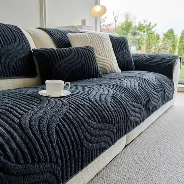 Dark gray textured sofa cover with wavy ribbed pattern made of plush soft material for living room set