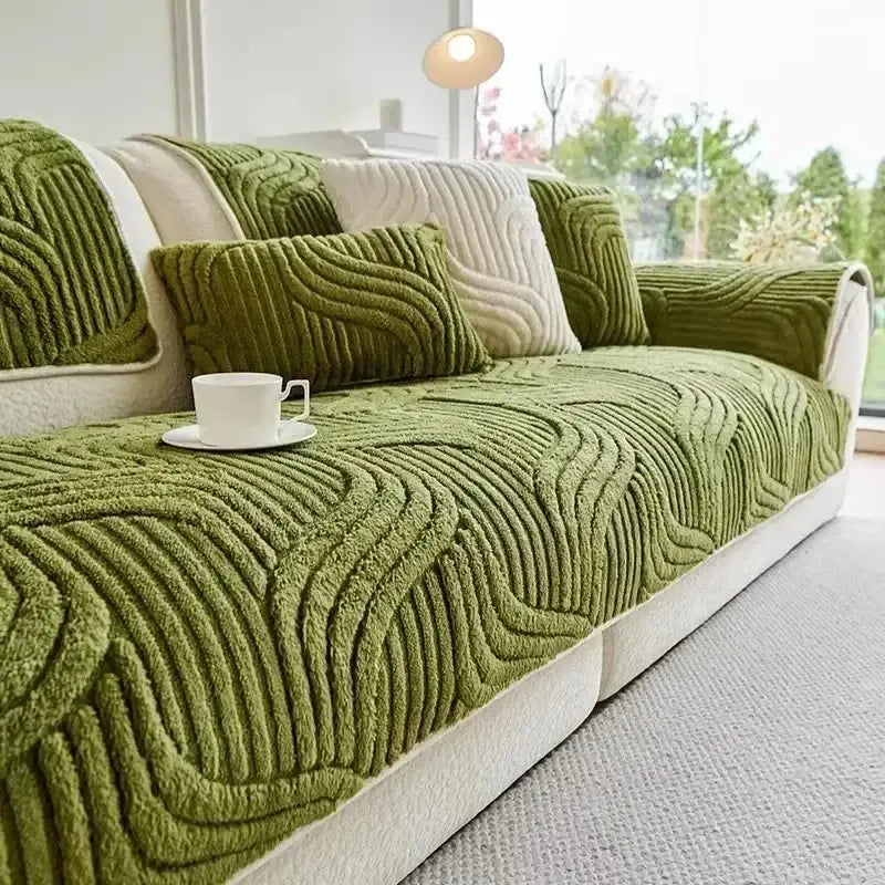 Olive green textured sofa cover with plush wave-like pattern complementing wavy ribbed cream plush living room set