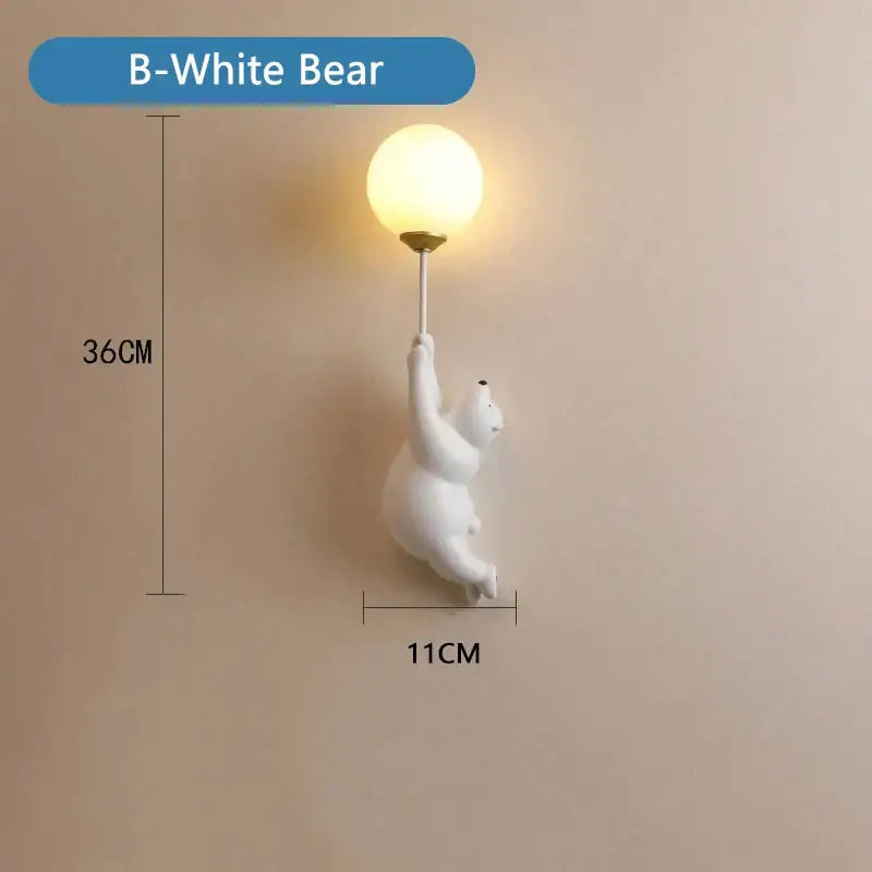 White ceramic polar bear wall lamp with spherical frosted glass bulb for whimsical bear 3d moon bedroom lighting
