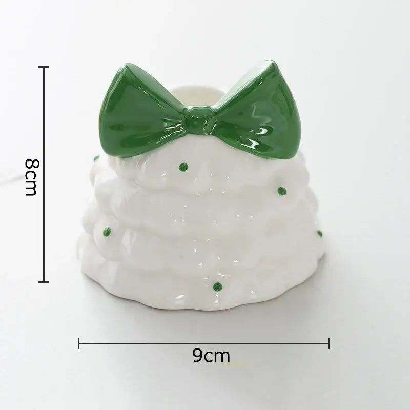 White ceramic tiered cake candle holder with green polka dots and glossy bow decorbites bowknot tree design