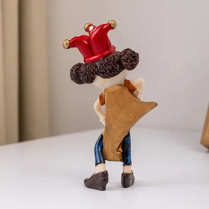 Whimsical clown resin art statue with glossy red crown and detailed tan blue clothing for decorbites clown resin decor