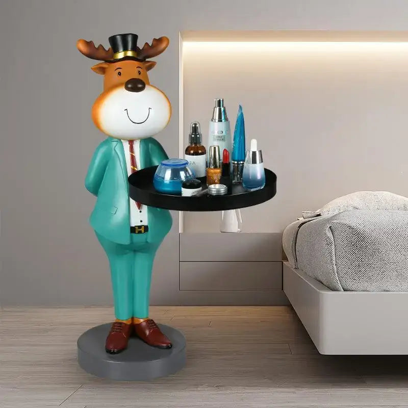 A cheerful teal dapper deer landing tray ornament holding beauty products for living room decor