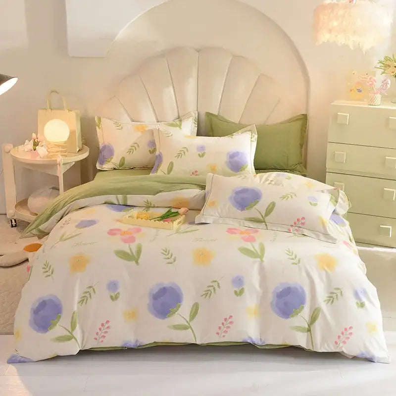 A soft floral-patterned cotton thickened bedding set in pastel lavender yellow and green for bedroom decorbites decor
