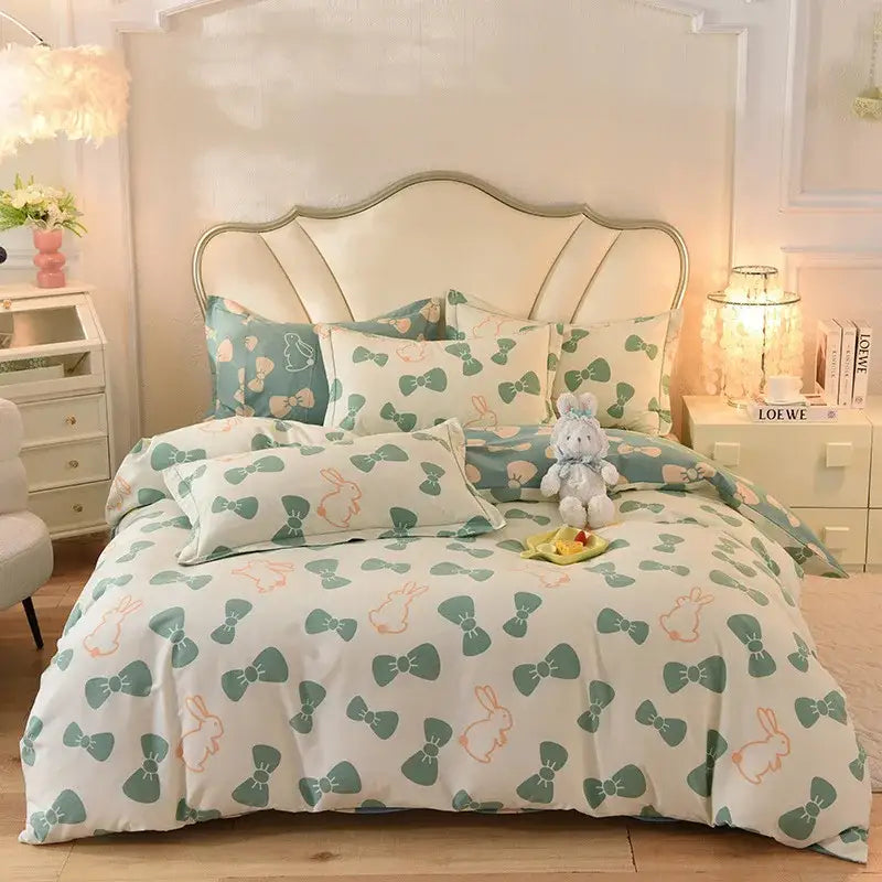 A cream bedding set featuring playful green and peach bows and bunnies in decorbites cotton thickened fabric