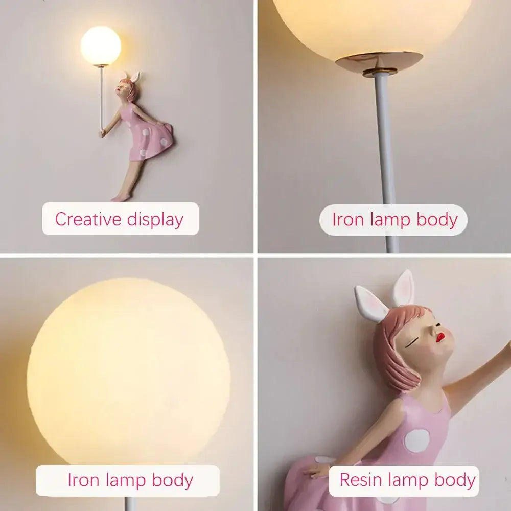 Whimsical pink resin girl wall lamp with bunny ears and polka dot dress for bedroom decoration