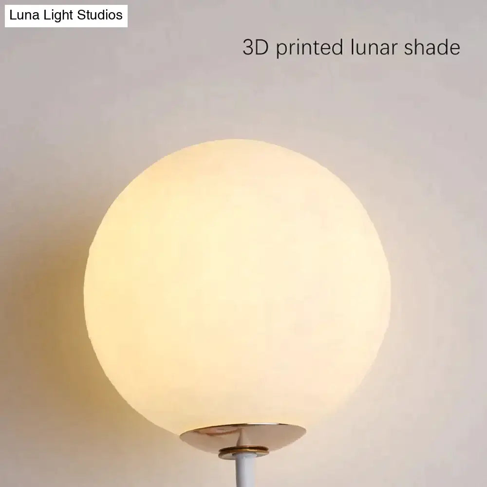 Whimsical pink polka dot fairy girl wall lamp with a soft spherical 3d printed lunar shade in luminous material