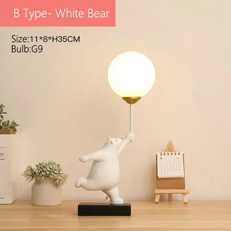 White ceramic bear moon table lamp with frosted glass globe and gold-toned base for whimsical bedroom lighting