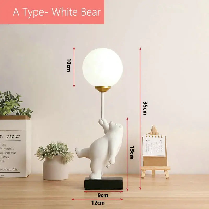 White ceramic bear moon lamp with gold stem and spherical lampshade on black base for bedroom table lamp