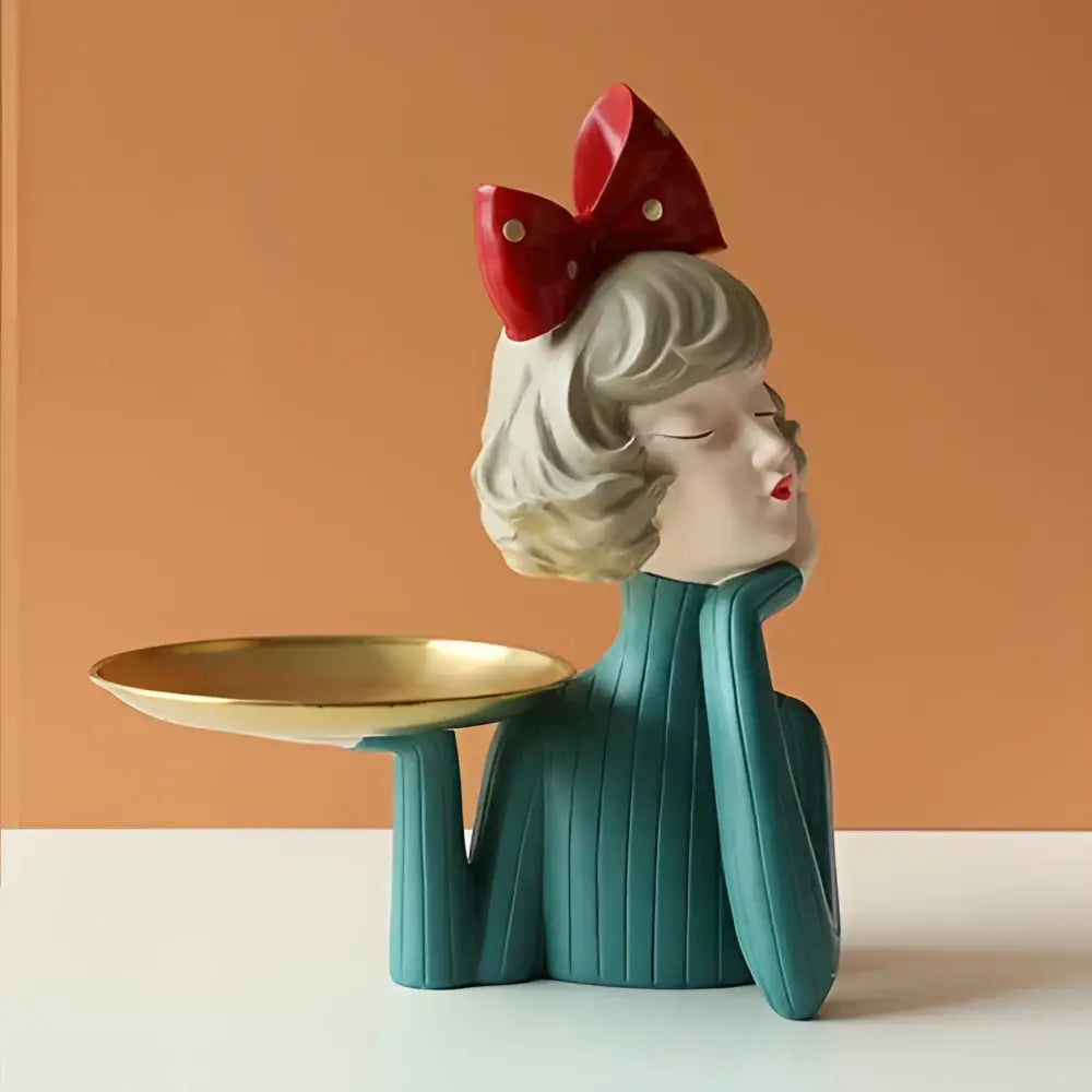 Teal bubble girl resin figurine with closed eyes red bow holding gold tray whimsical living room decor