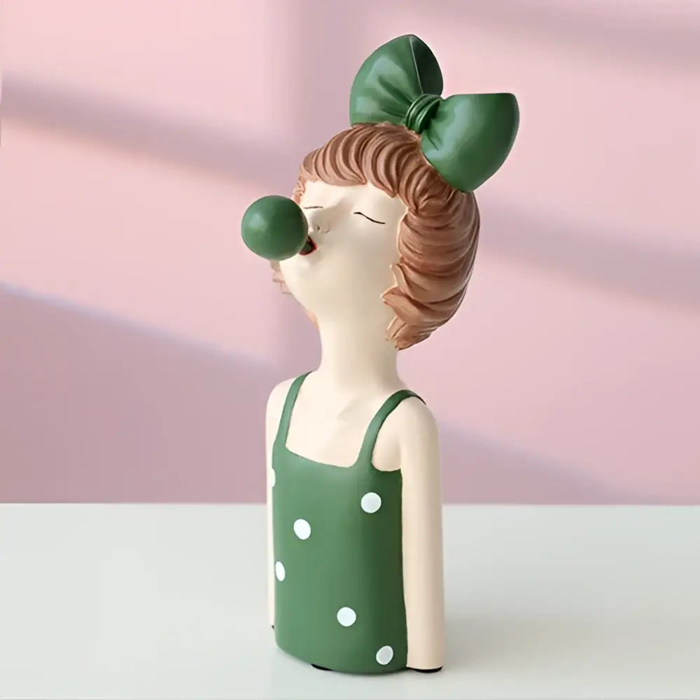 Whimsical green polka dot bubble girl resin figurine with matching bow for living room decor