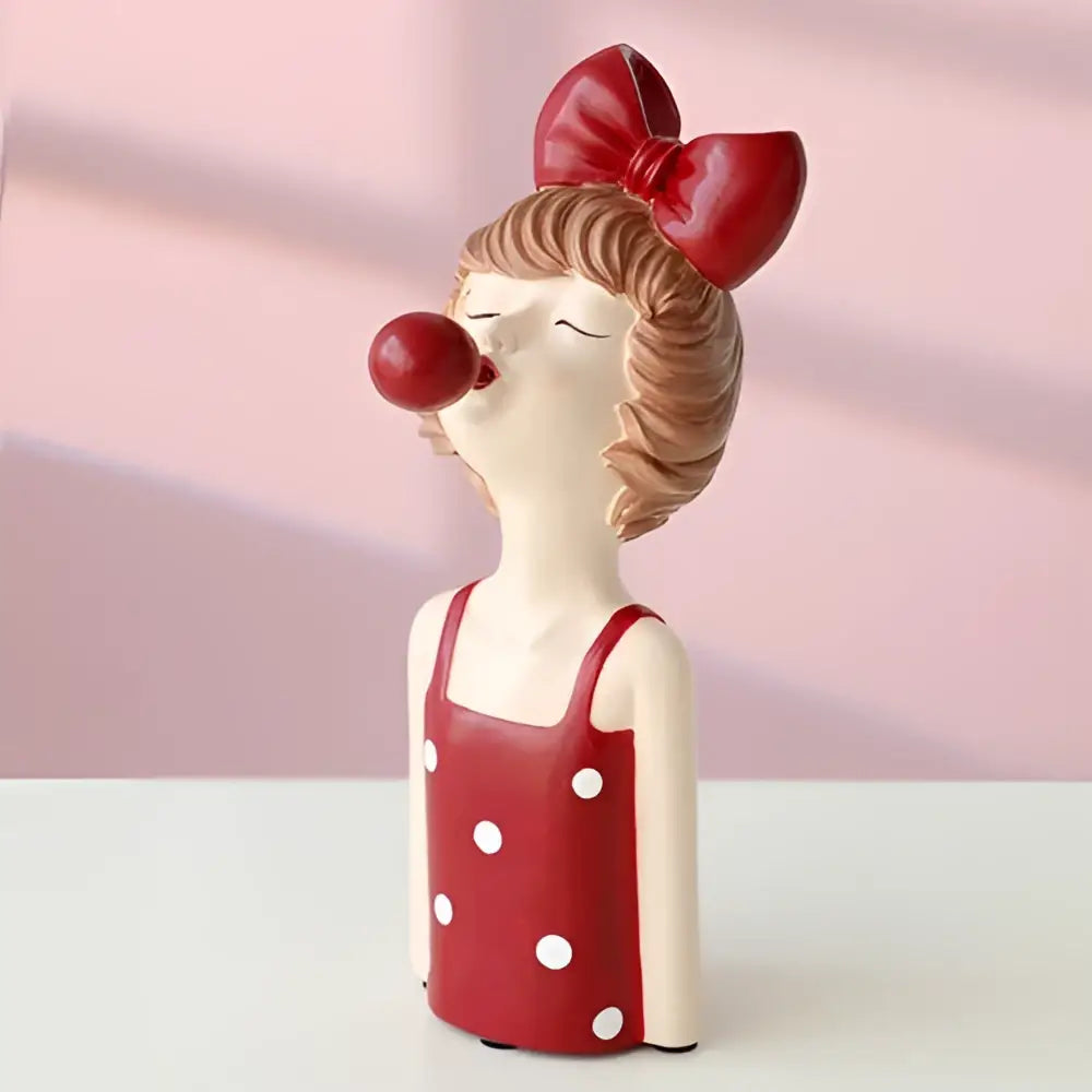 Red polka dot bubble girl resin figurine with glossy red bow and nose for whimsical living room decor