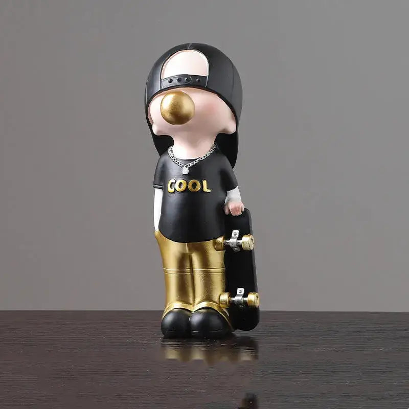 Black and gold resin stylized skateboarder figurine with metallic pants in whimsical decorbites boys sports statues set