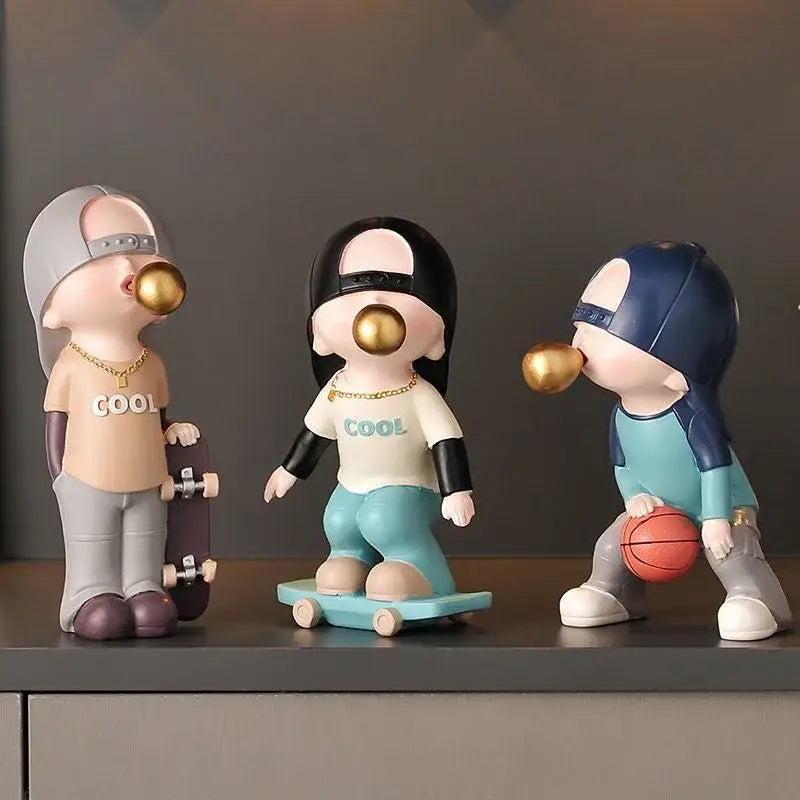 Whimsical resin boys sports statues set with gold bubblegum and sports gear for decorbites boys sports bedroom decor