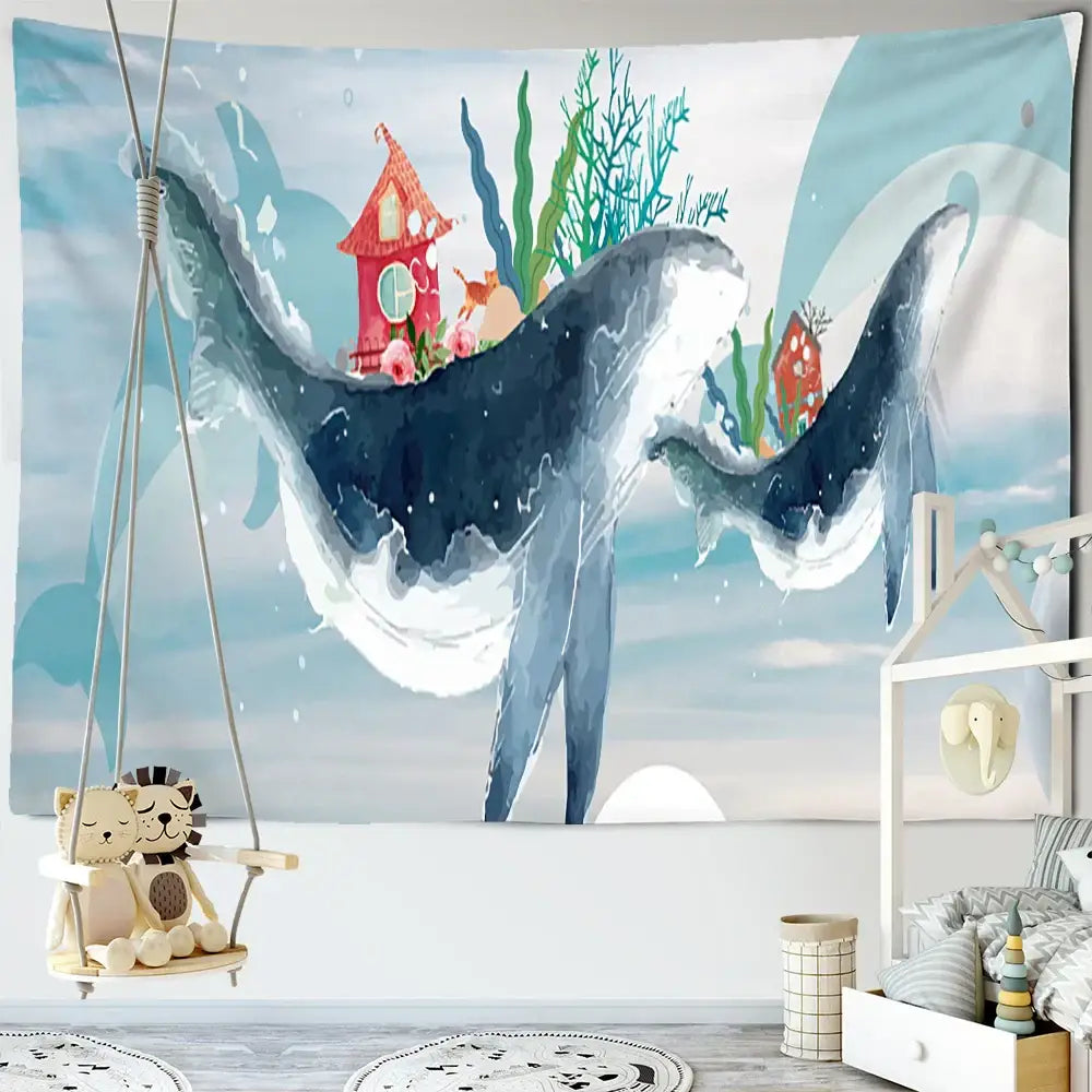 Whimsical teal and white dream whale tapestry wall hanging featuring a red house, green seaweed, and pink flowers decorbites dream whale decor