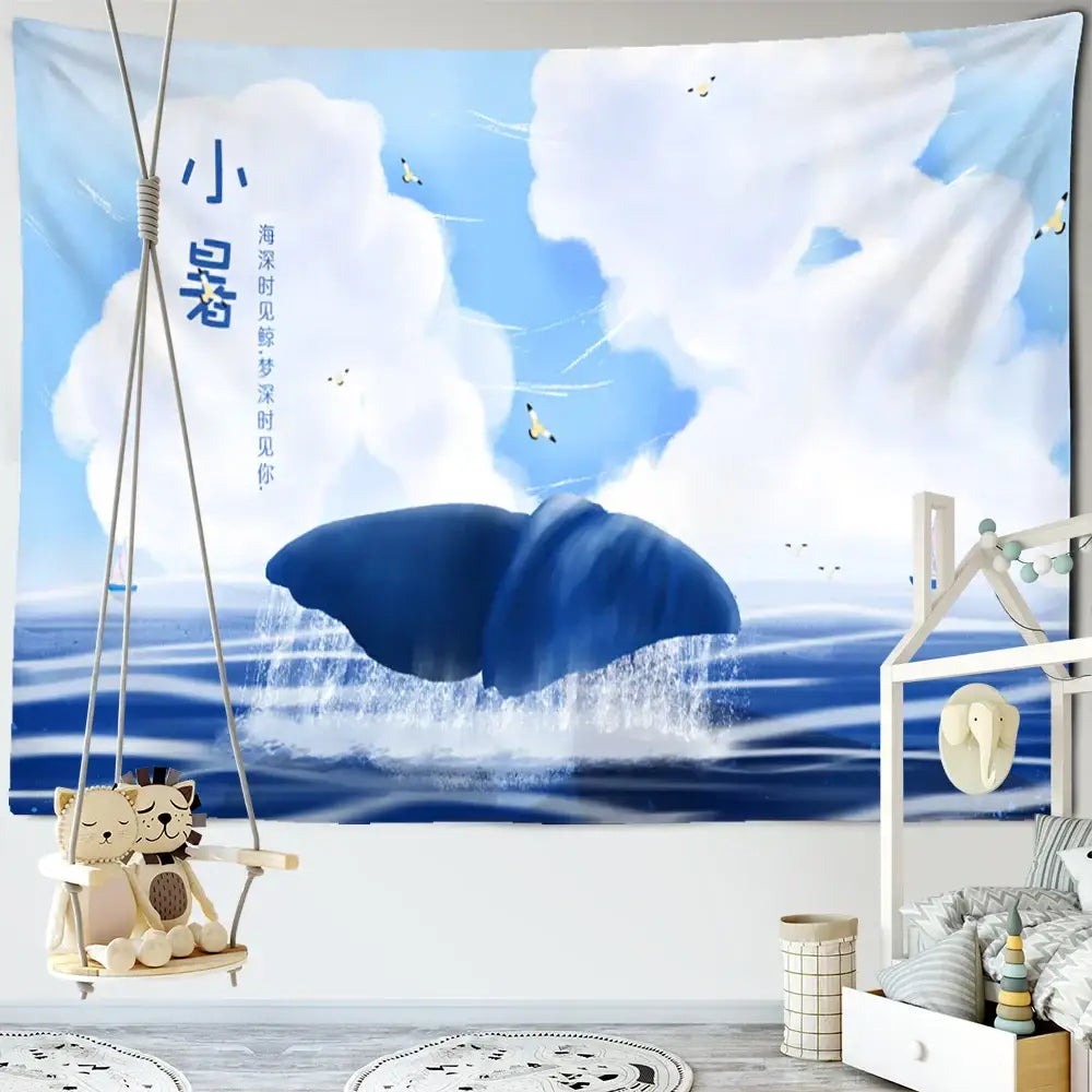 Whimsical teal and white dream whale tapestry wall hanging with blue whale tail, clouds, and birds for kids room decorbites dream whale