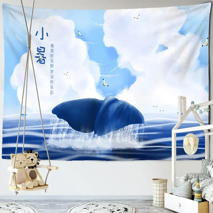 Whimsical teal and white dream whale tapestry wall hanging with blue whale tail, clouds, and birds for kids room decorbites dream whale