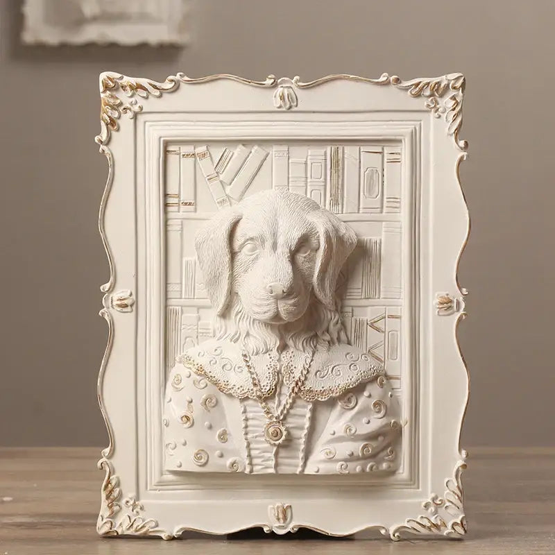White ornate wall decoration frame with sculpted dog portrait in regal attire against bookshelf background