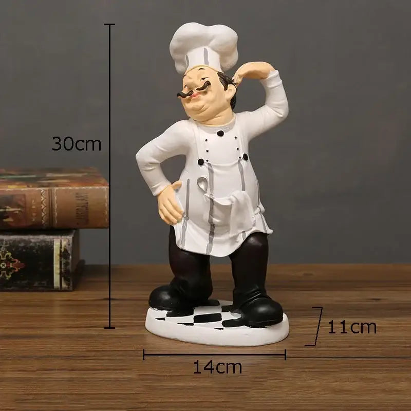 Whimsical white and black bearded chef resin figure with tall hat mustache and apron kitchen decor