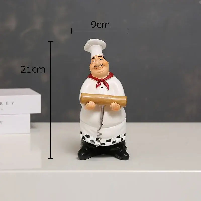 Whimsical white bearded chef resin figure with red neckerchief holding wooden rolling pin corkscrew kitchen decor