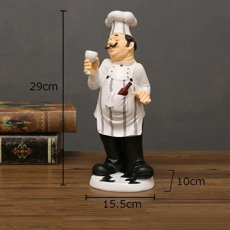 Cheerful white bearded chef resin figure with toque striped apron black pants holds wine glass and bottle kitchen decor