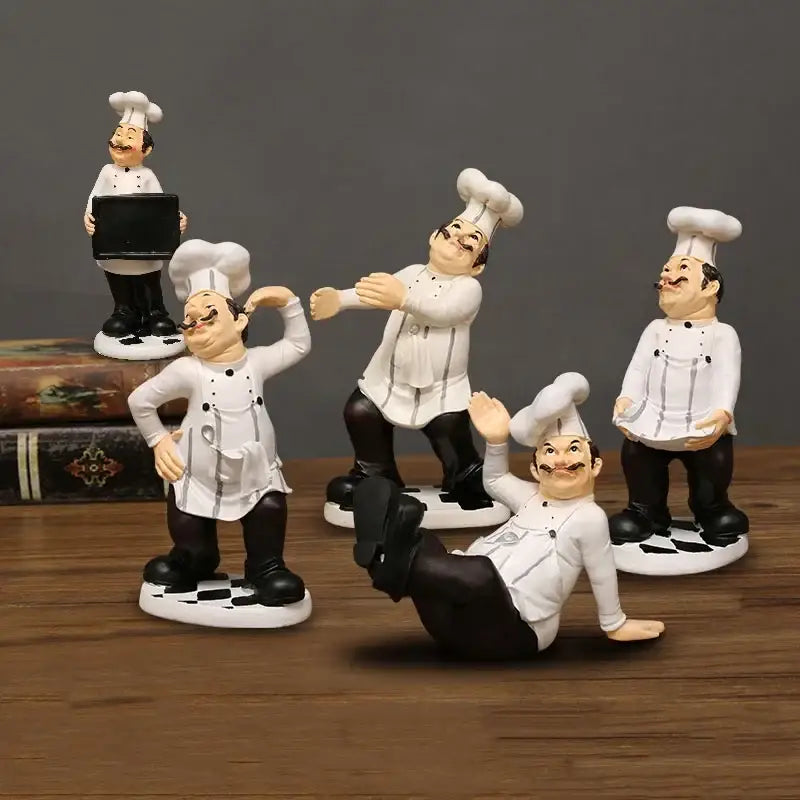 Set of five whimsical white bearded chef resin figures in uniforms on checkered bases for kitchen decor