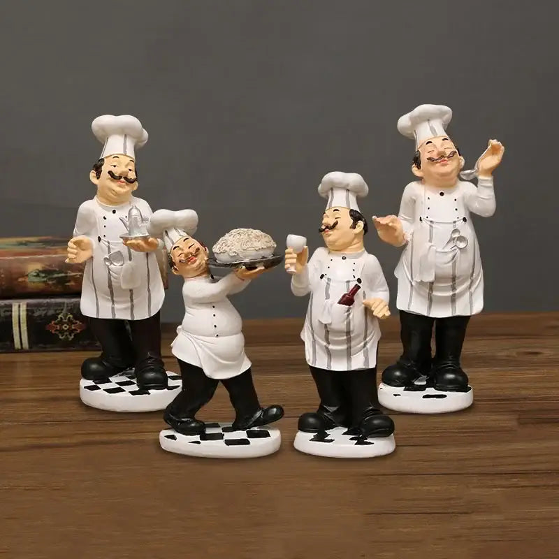 Set of four whimsical white bearded chef resin figures in detailed uniforms on checkered bases for kitchen decor