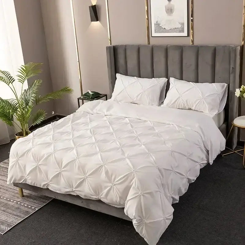 White 3d pinch pleat duvet cover set with diamond pattern featuring soft fabric and matching pillows for bedroom use